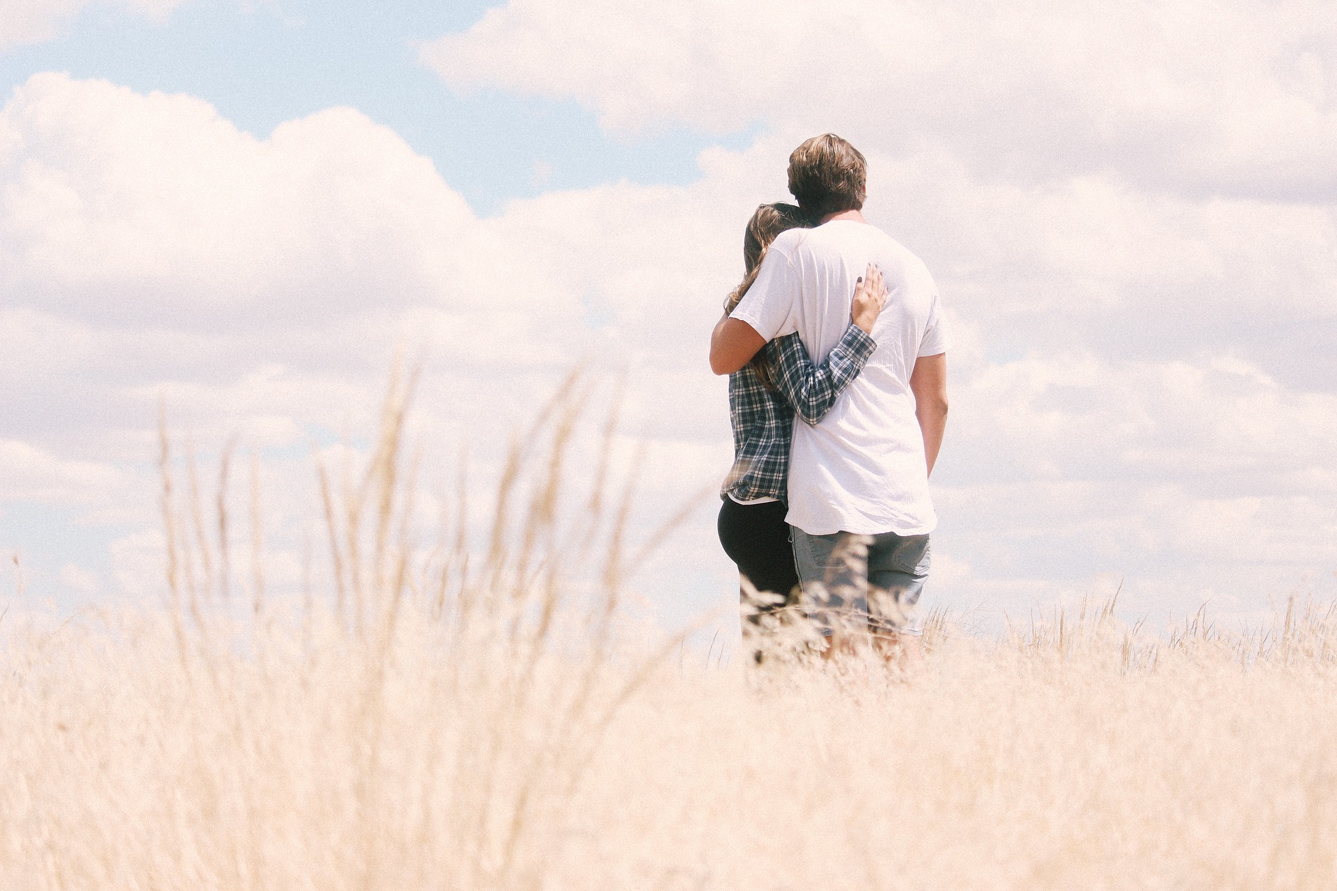 man and women in field