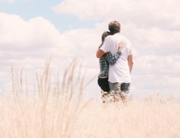 man and women in field