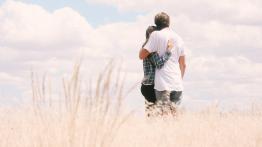 man and women in field